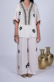 Ivory Crepe Co-ord Set with Bandhani-Print, Cowrie Shell Yoke & Palazzo