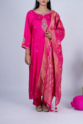 Kesariya Noor Embroidered Raw Silk Suit Set with Banarasi Dupatta